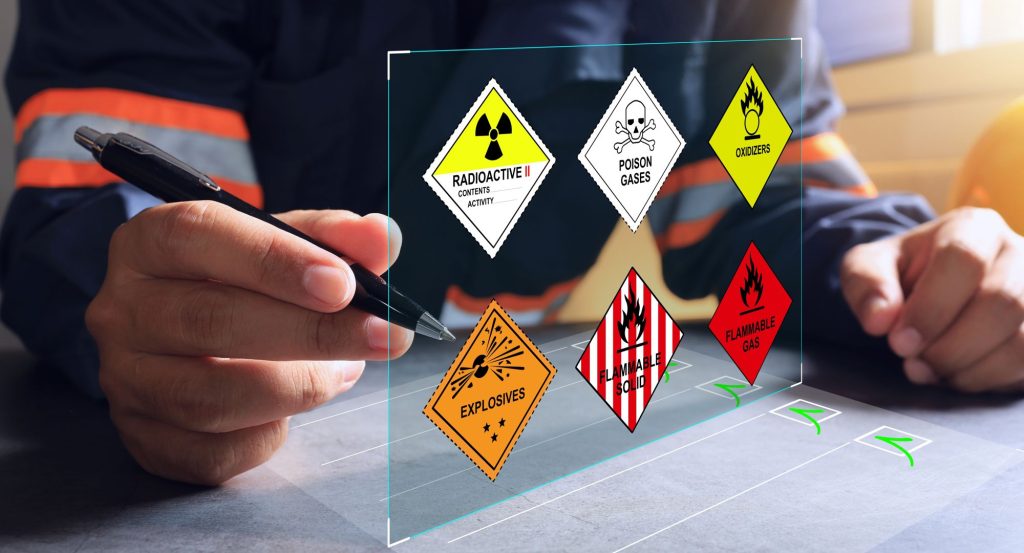 hand pointing at DOT-RCRA safety warning icons